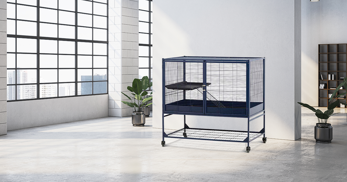 Royal Suite 100 Single Unit cage placed in modern loft with large windows and plants.