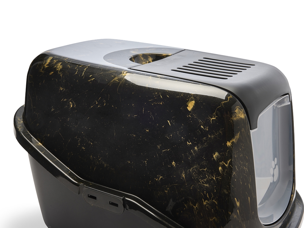 Detail view of Savic Nestor Marble cat litter box in black and gold marble finish with folding front and carbon filter